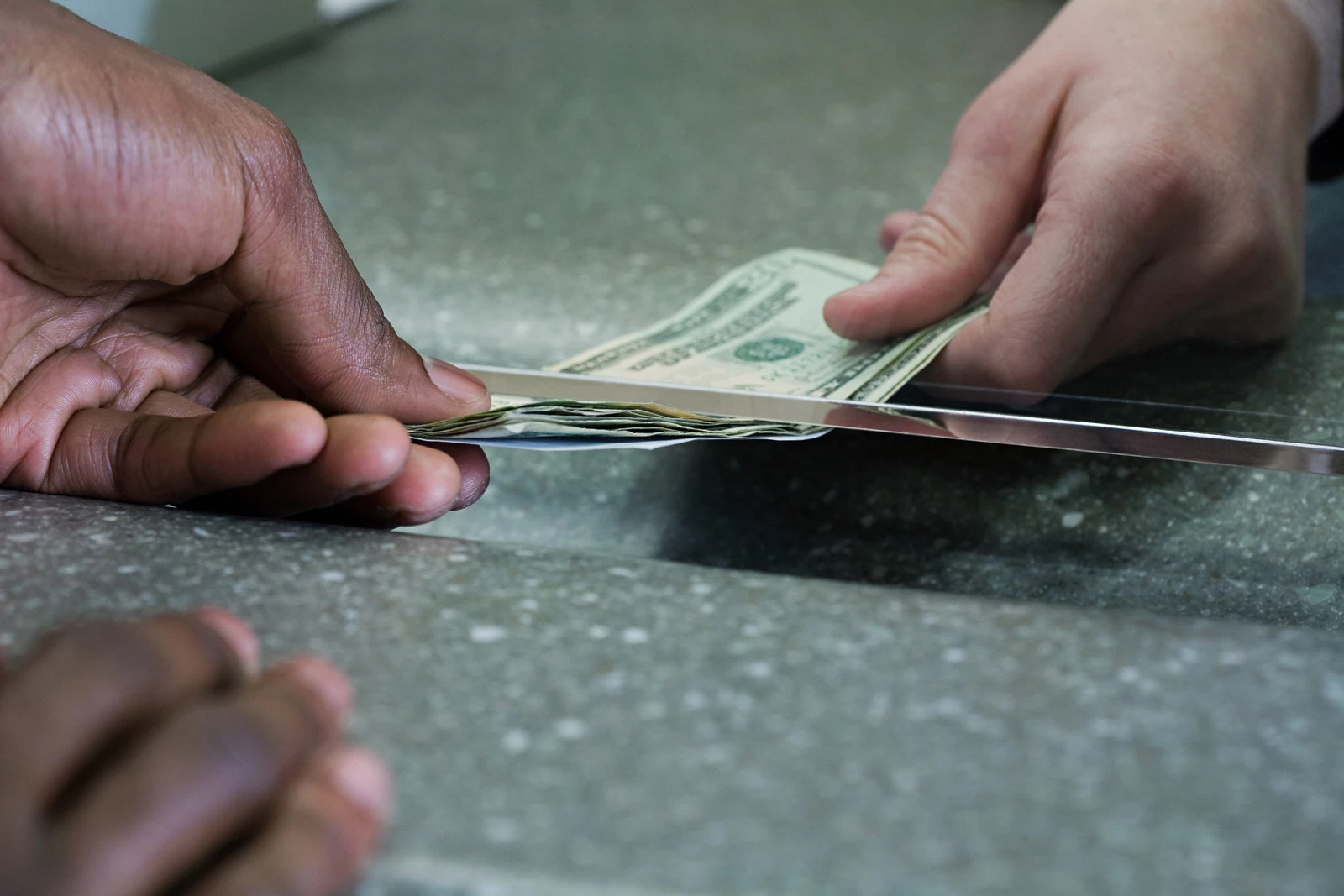 Hand Exchanging Money